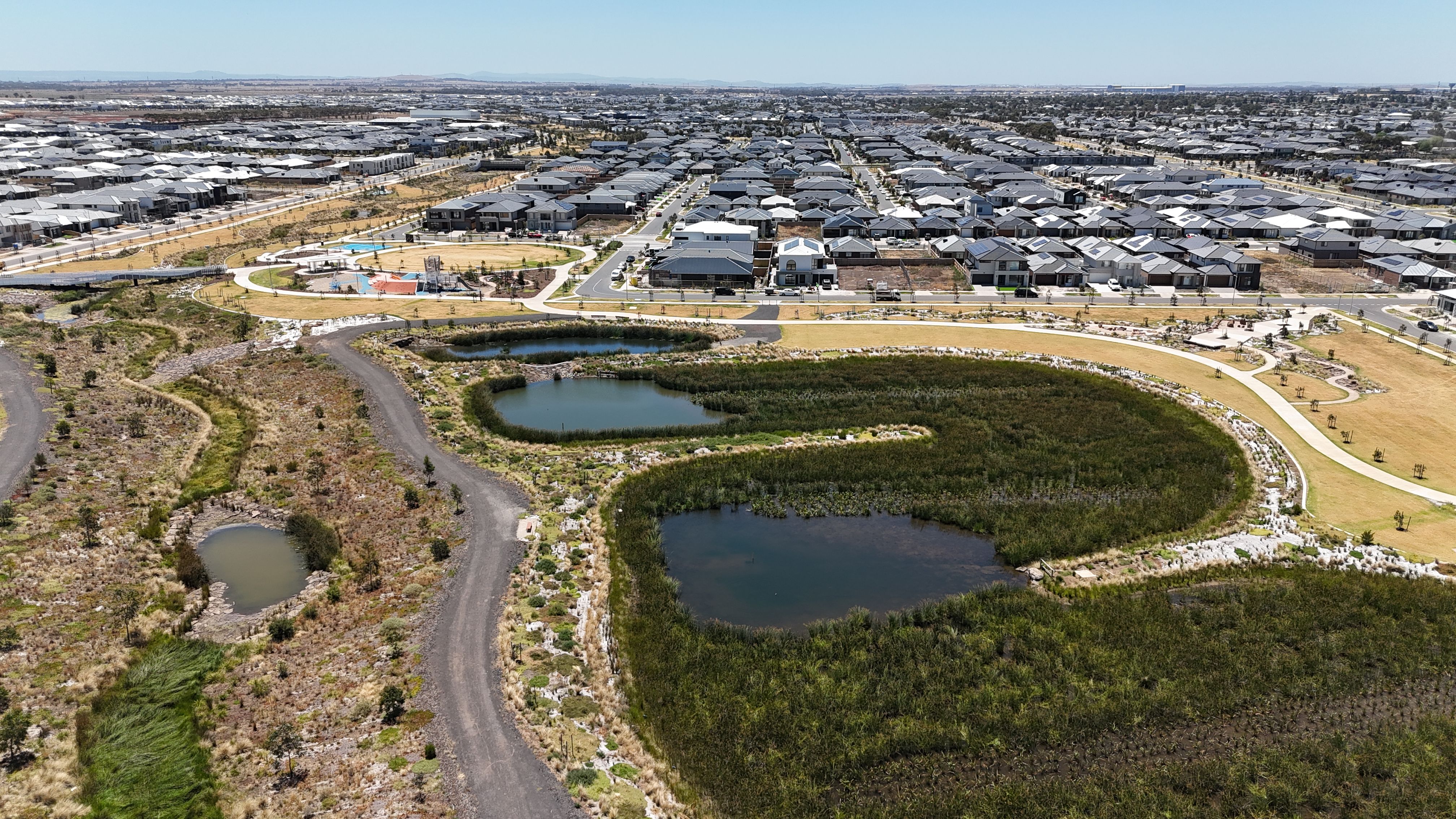 Wetland habitat alongside completed residential development.